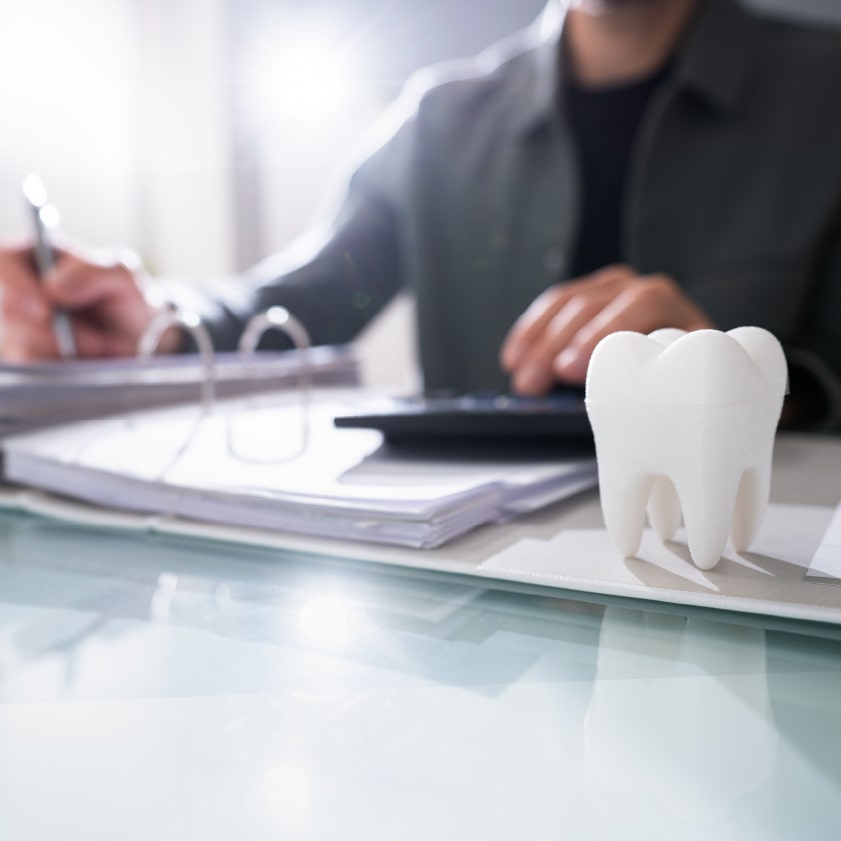 Close-up of a tooth model on a desk | Kokua Smiles